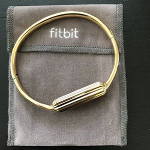 Brand new never worn Fitbit gold bracelet/ bangle